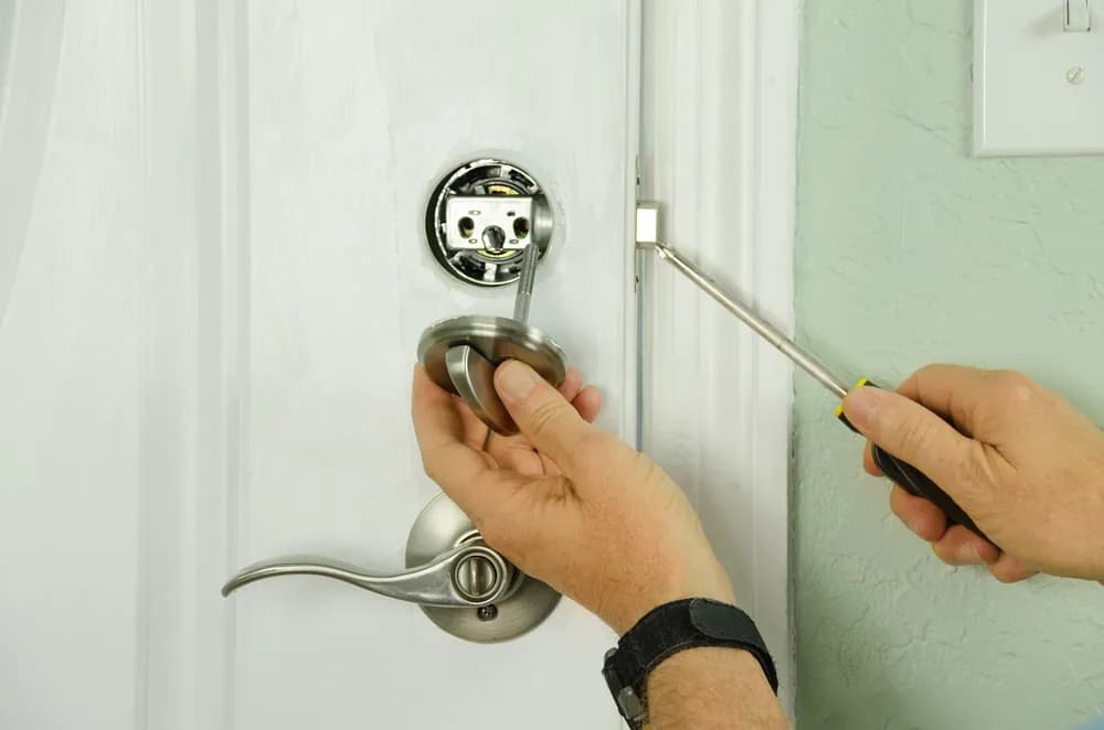 Lock repair work being carried out on a door lock